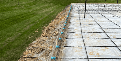 A tennis court under construction